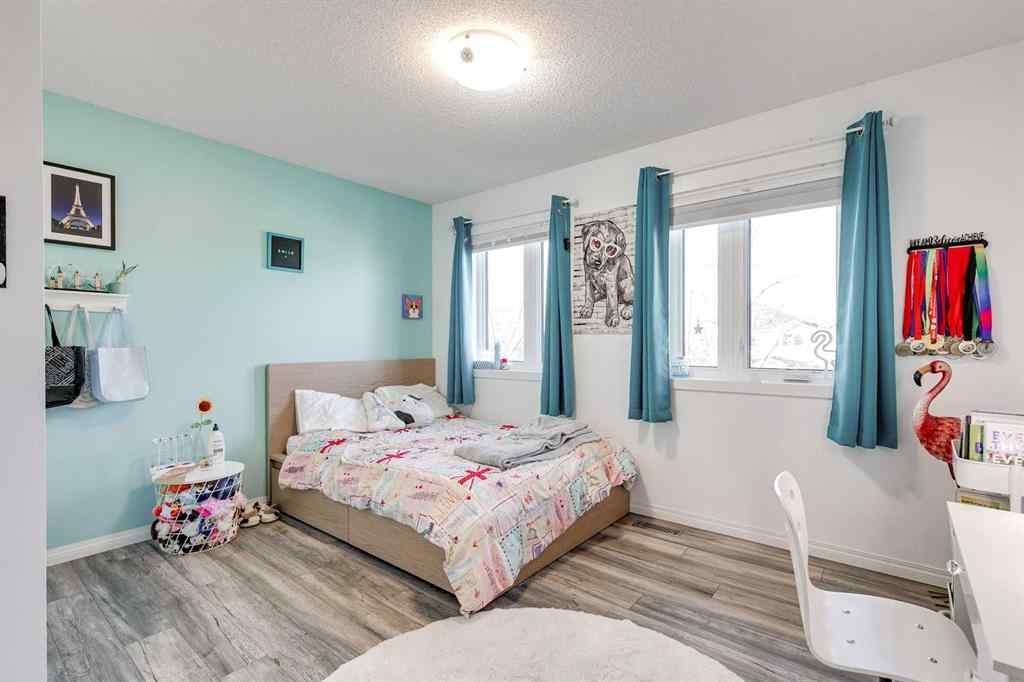 MLS® A2269508 - 113 Rockbluff Place NW in Rocky Ridge Calgary, Residential