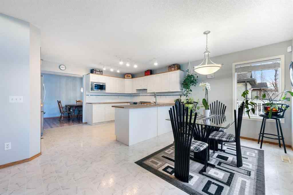 MLS® A2269515 - 42 Harvest Grove Close NE in Harvest Hills Calgary, Residential