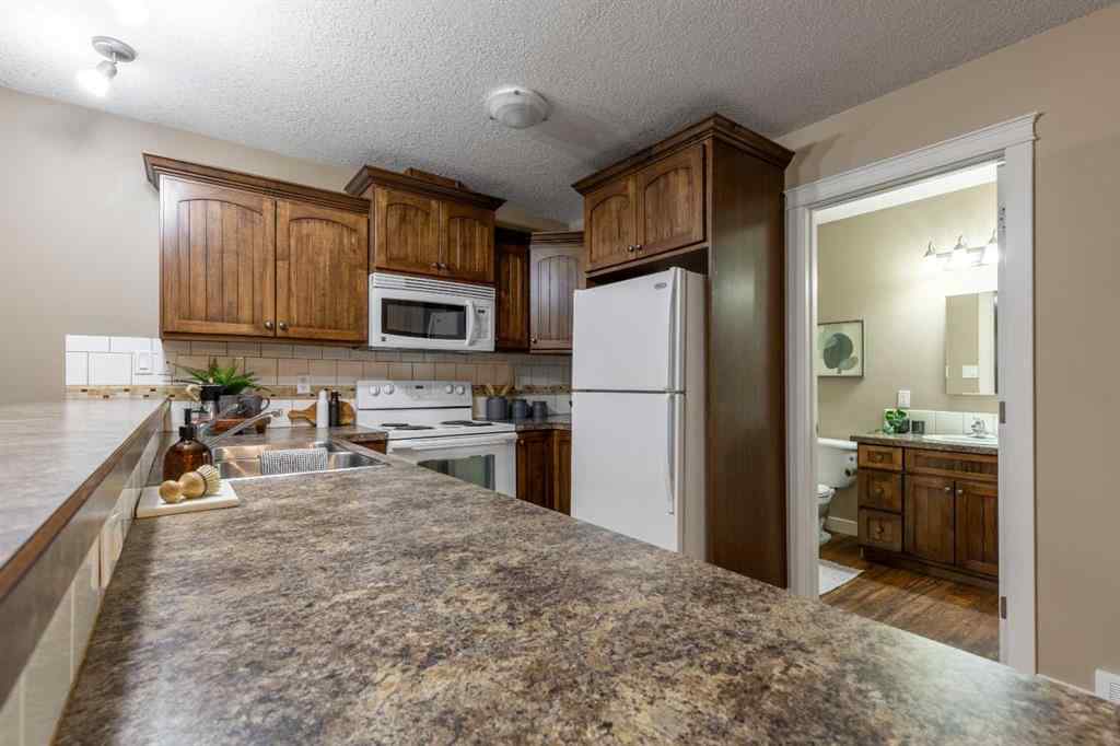 MLS&reg; # A2269524 - 4213 Sundance Road  in NONE Coalhurst, Residential Open Houses
