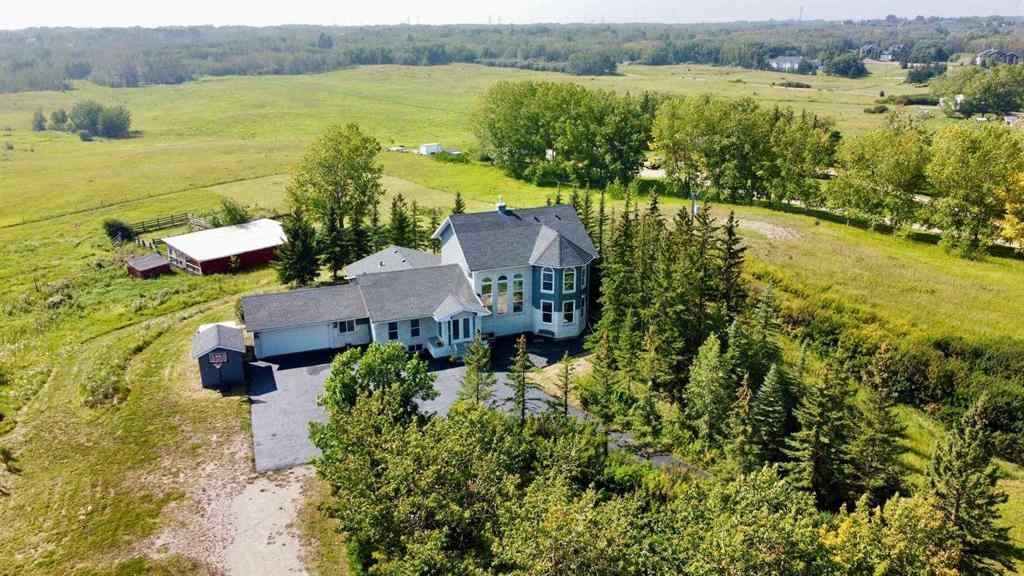 MLS® A2269530 - 24073 Burma Road  in Bearspaw_Calg Rural Rocky View County, Residential