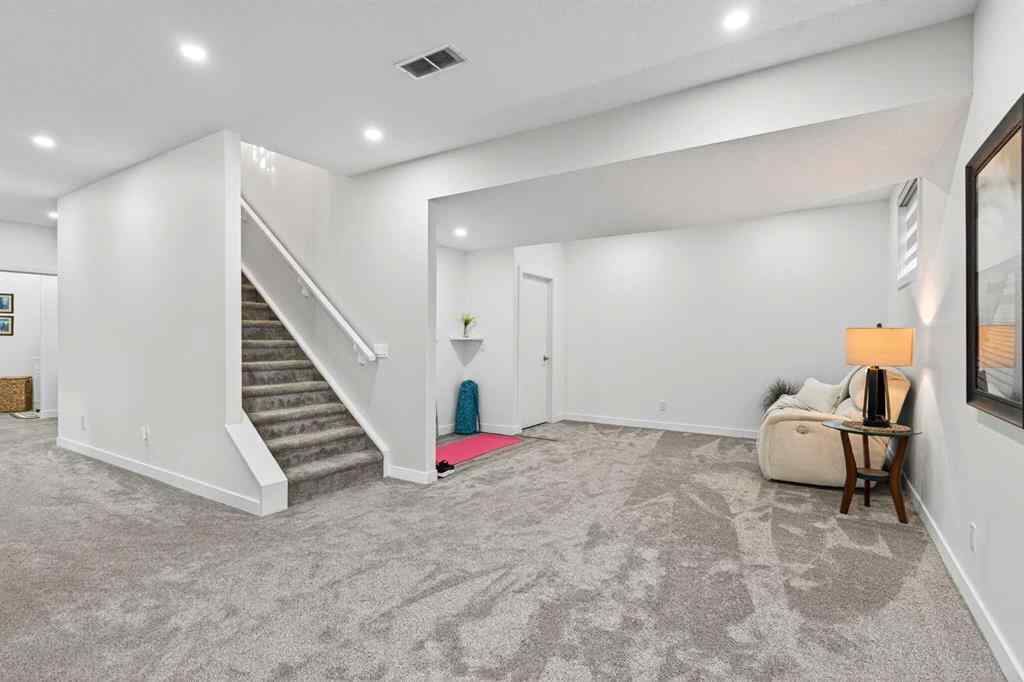 MLS® A2269549 - 734 Woodside Bay NW in Woodside Airdrie, Residential