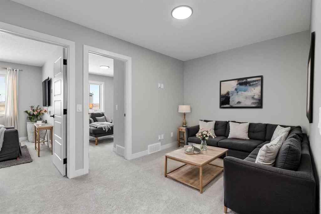 MLS® A2269561 - 65 Amblefield Heights NW in Moraine Calgary, Residential