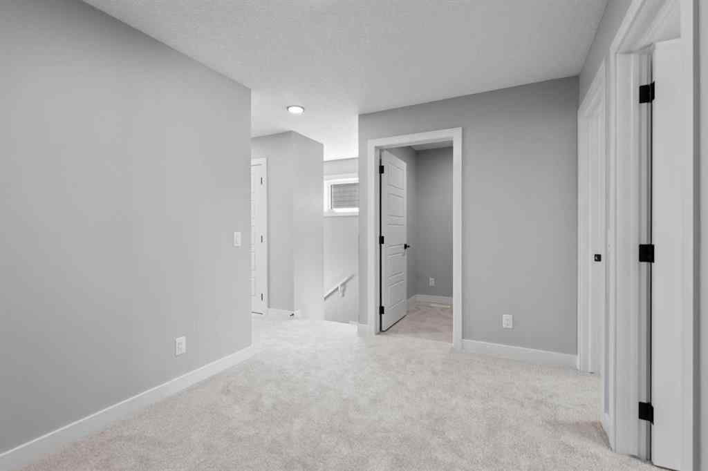 MLS® A2269561 - 65 Amblefield Heights NW in Moraine Calgary, Residential