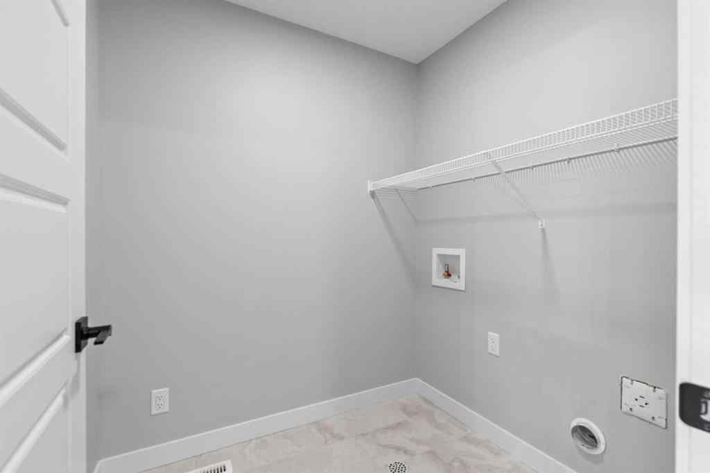 MLS® A2269561 - 65 Amblefield Heights NW in Moraine Calgary, Residential