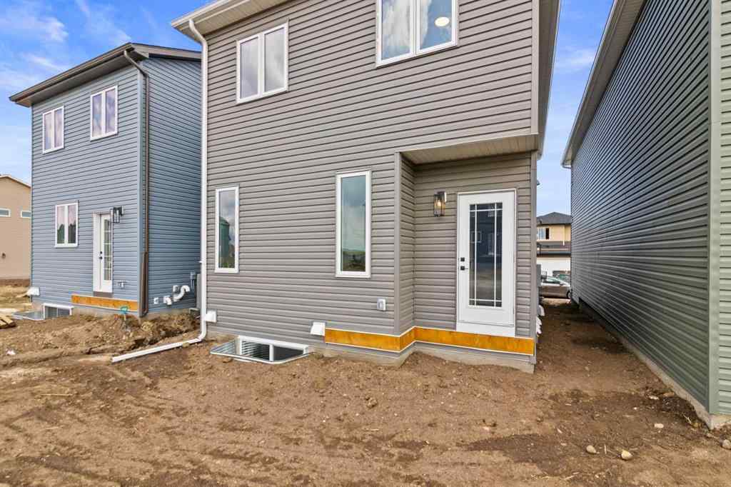 MLS® A2269561 - 65 Amblefield Heights NW in Moraine Calgary, Residential