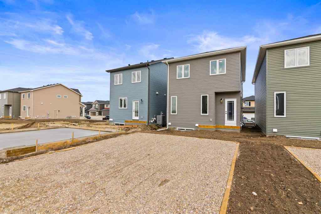 MLS® A2269561 - 65 Amblefield Heights NW in Moraine Calgary, Residential