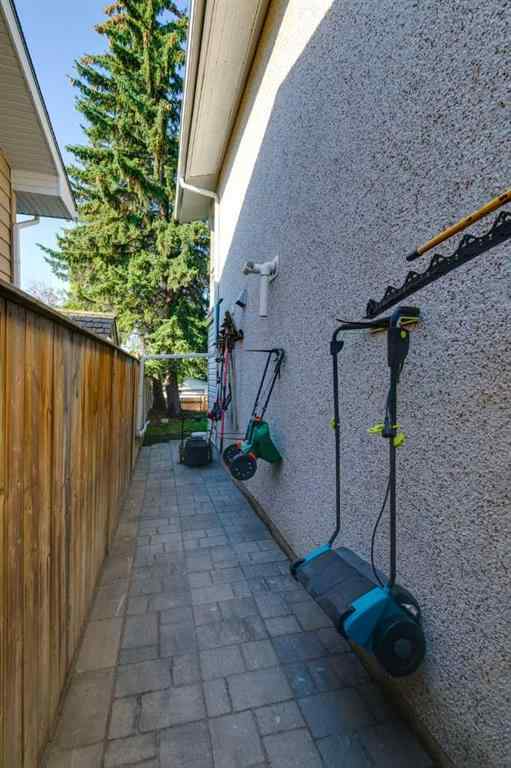 MLS&reg; # A2269583 - 5119 Carney Road NW in Charleswood Calgary, Residential Open Houses