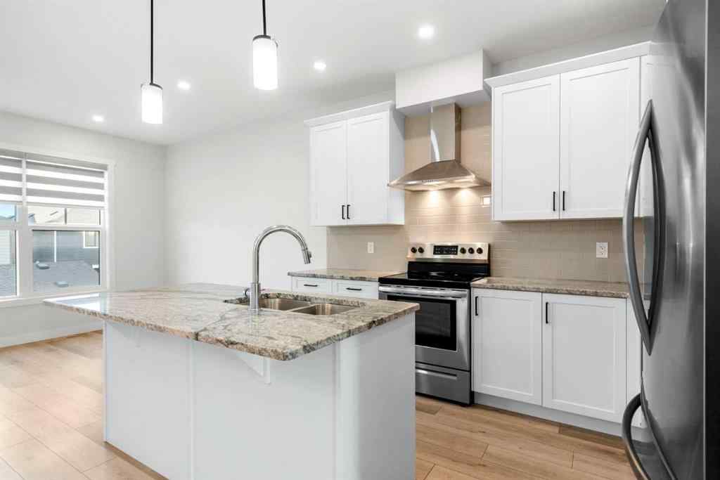 MLS® A2269611 - 242 Alpine Avenue SW in Alpine Park Calgary, Residential