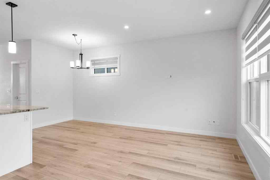 MLS® A2269611 - 242 Alpine Avenue SW in Alpine Park Calgary, Residential