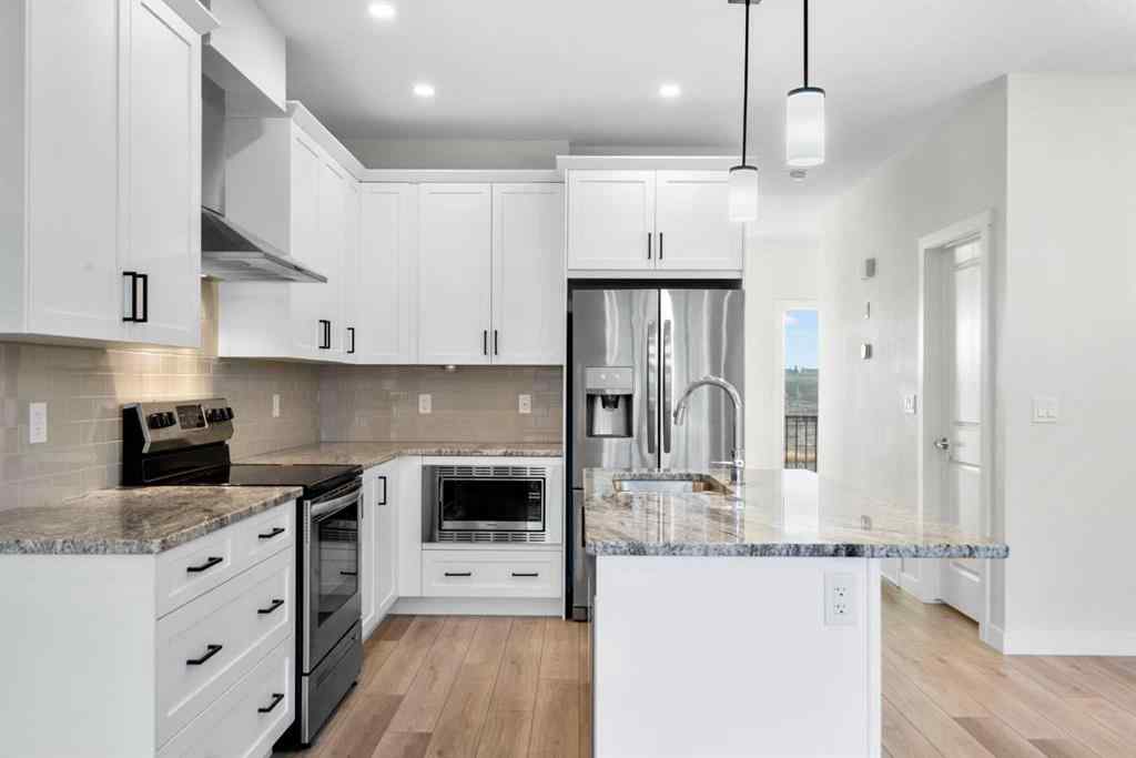 MLS® A2269611 - 242 Alpine Avenue SW in Alpine Park Calgary, Residential