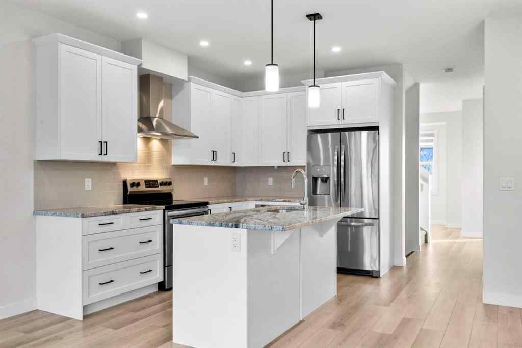 MLS® A2269611 - 242 Alpine Avenue SW in Alpine Park Calgary, Residential