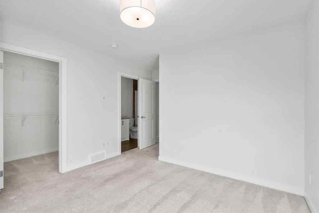 MLS® A2269611 - 242 Alpine Avenue SW in Alpine Park Calgary, Residential