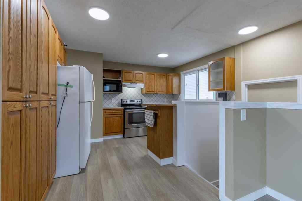 MLS&reg; # A2269640 - 1001 19A Avenue  in NONE Coaldale, Residential Open Houses