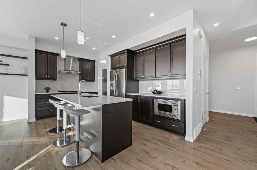 MLS&reg; # A2269646 - 126 Howse Common NE in Livingston Calgary, Residential Open Houses