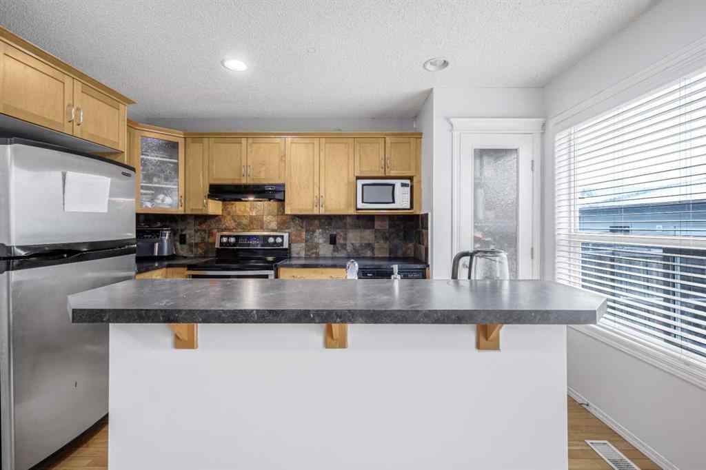 MLS&reg; # A2269667 - 102 Evansford Grove NW in Evanston Calgary, Residential Open Houses