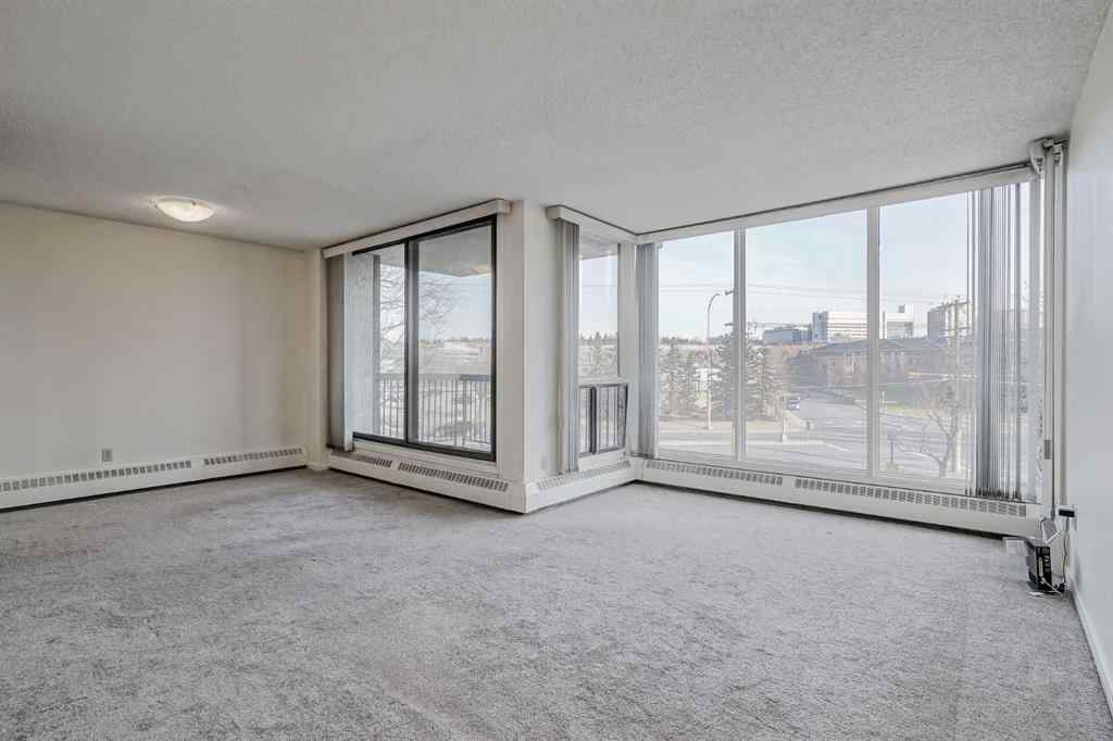 MLS&reg; # A2269679 - Unit #305 145 Point Drive NW in Point McKay Calgary, Residential Open Houses