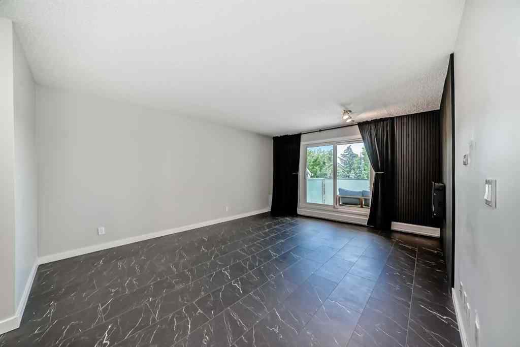 MLS&reg; # A2269682 - Unit #201 3727 42 Street NW in Varsity Calgary, Residential Open Houses