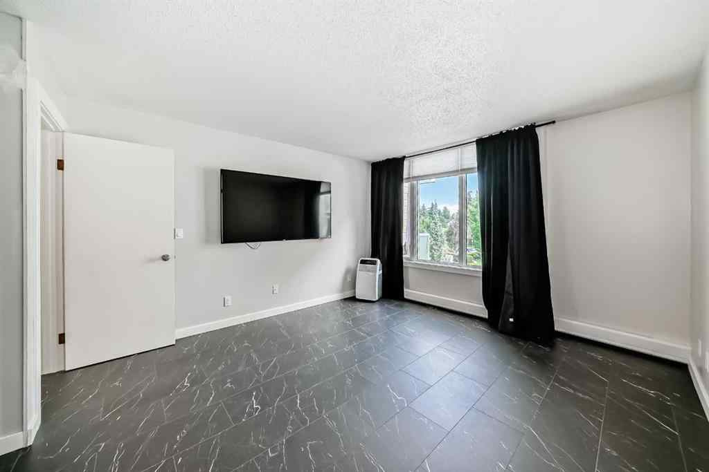 MLS&reg; # A2269682 - Unit #201 3727 42 Street NW in Varsity Calgary, Residential Open Houses