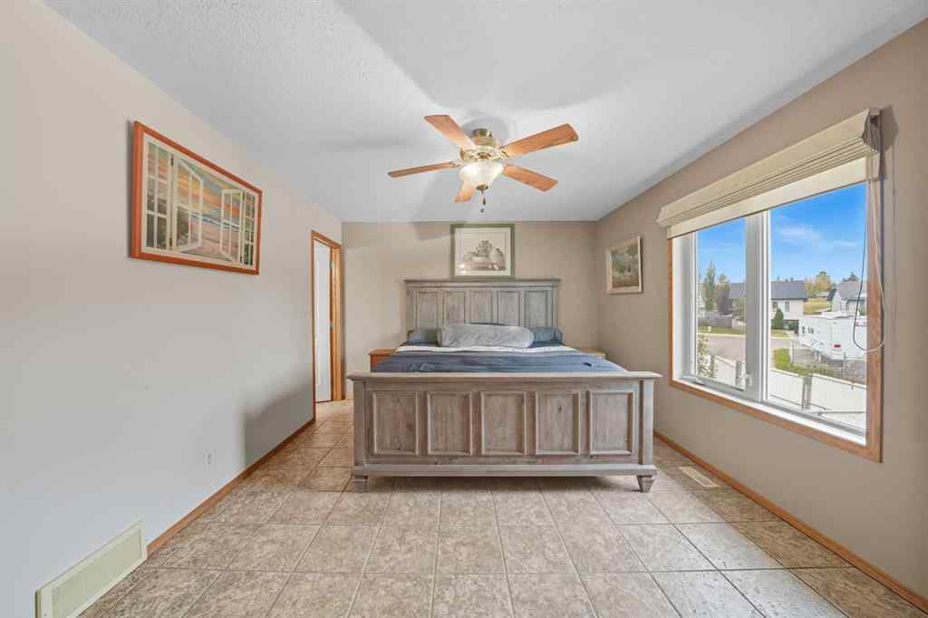 MLS&reg; # A2269698 - 5409 44A Street Close  in Westpark Meadows Innisfail, Residential Open Houses