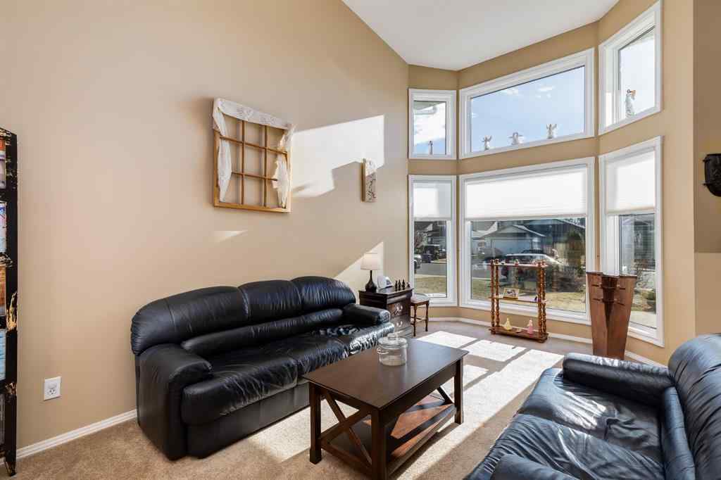 MLS® A2269704 - 1808 Meadowbrook Gate SE in Meadowbrook Airdrie, Residential