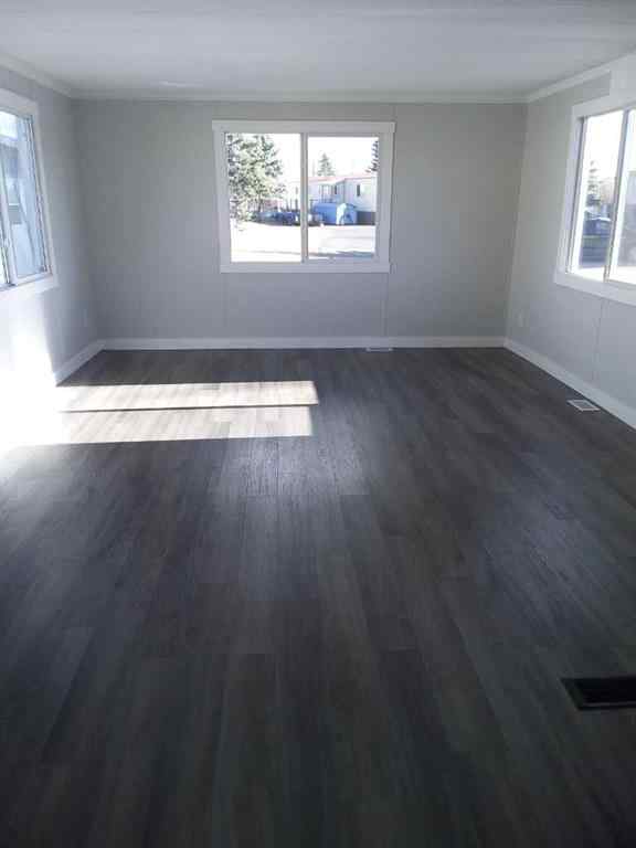 MLS&reg; # A2269777 - 421 Kannell Drive NE in North Central High River High River, Mobile Open Houses