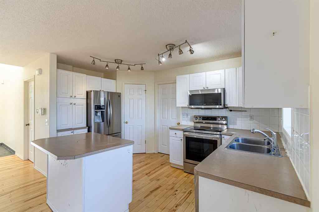 MLS&reg; # A2269781 - 49 Welshimer Crescent NE in NONE Langdon, Residential Open Houses