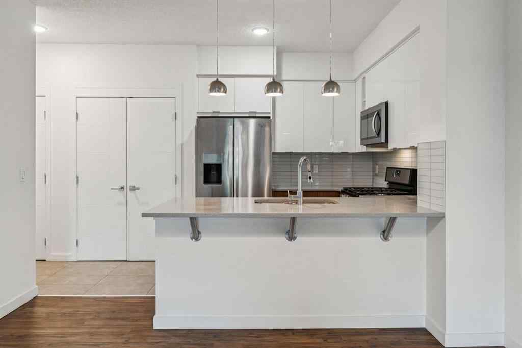 MLS&reg; # A2269800 - Unit #105 120 18 Avenue SW in Mission Calgary, Residential Open Houses