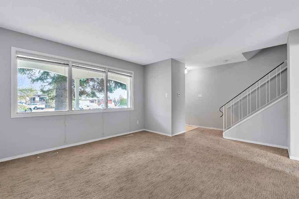 MLS&reg; # A2269818 - 57 & 59 Dalton Bay NW in Dalhousie Calgary, Residential Open Houses