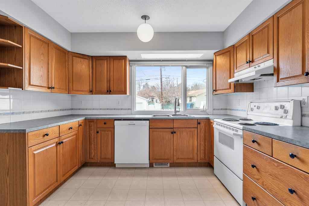 MLS&reg; # A2269818 - 57 & 59 Dalton Bay NW in Dalhousie Calgary, Residential Open Houses