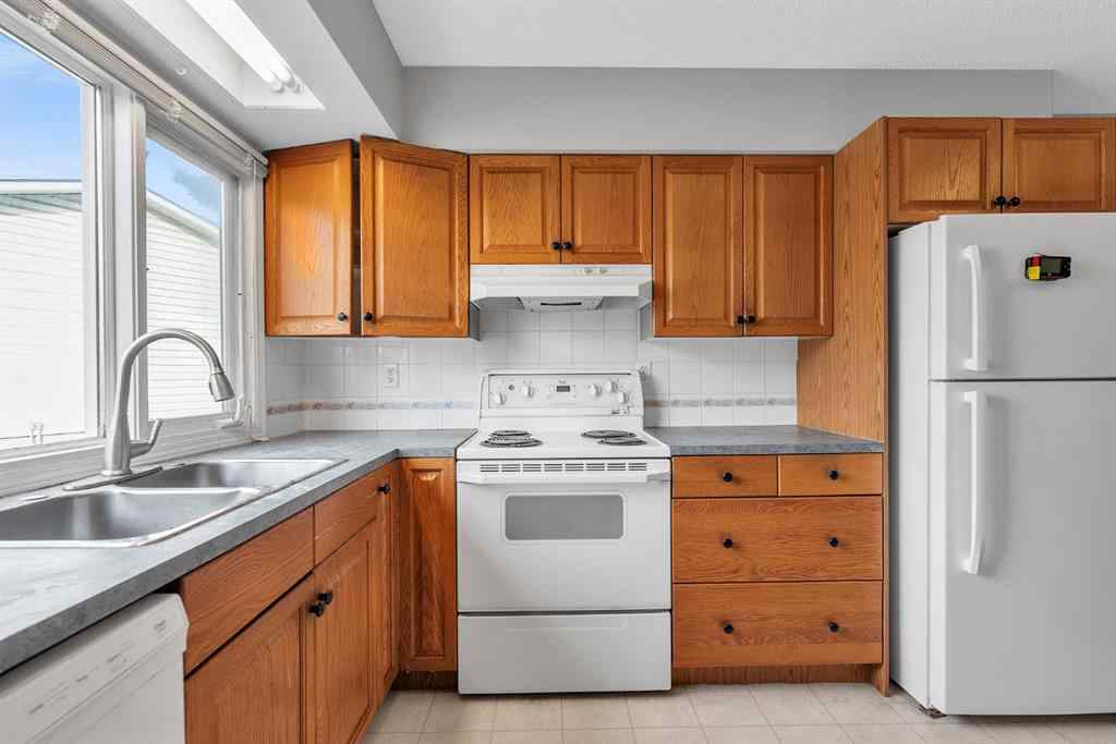 MLS&reg; # A2269818 - 57 & 59 Dalton Bay NW in Dalhousie Calgary, Residential Open Houses