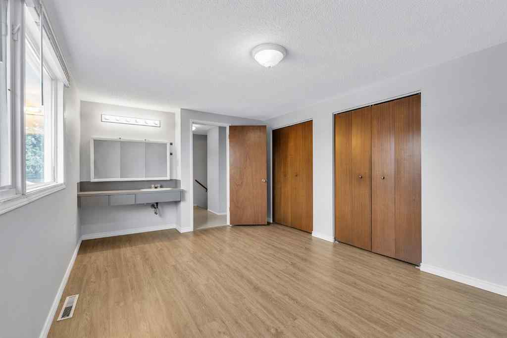 MLS&reg; # A2269818 - 57 & 59 Dalton Bay NW in Dalhousie Calgary, Residential Open Houses