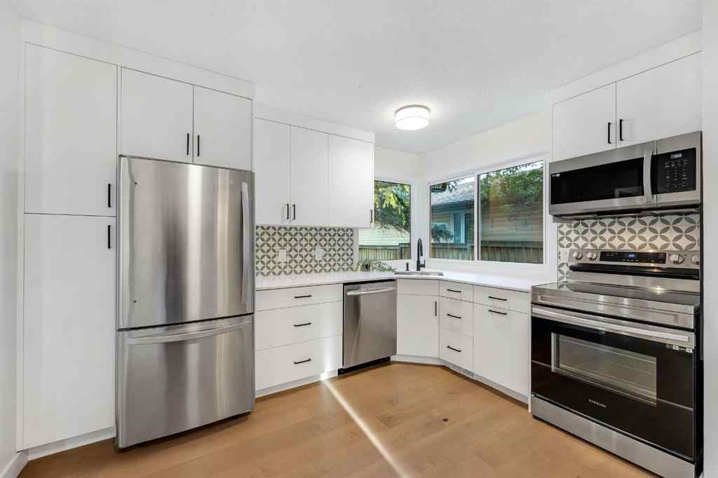 MLS&reg; # A2269828 - 212 Midlawn Close SE in Midnapore Calgary, Residential Open Houses