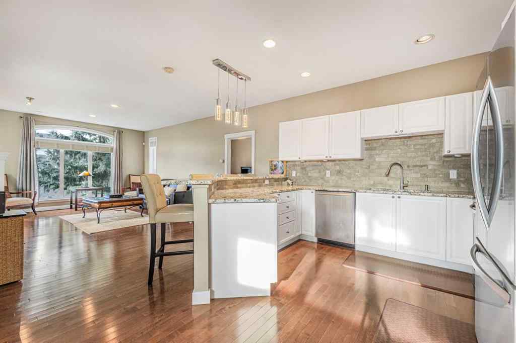 MLS&reg; # A2269829 - Unit #1302 8000 Wentworth Drive SW in West Springs Calgary, Residential Open Houses