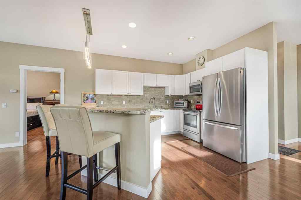 MLS&reg; # A2269829 - Unit #1302 8000 Wentworth Drive SW in West Springs Calgary, Residential Open Houses