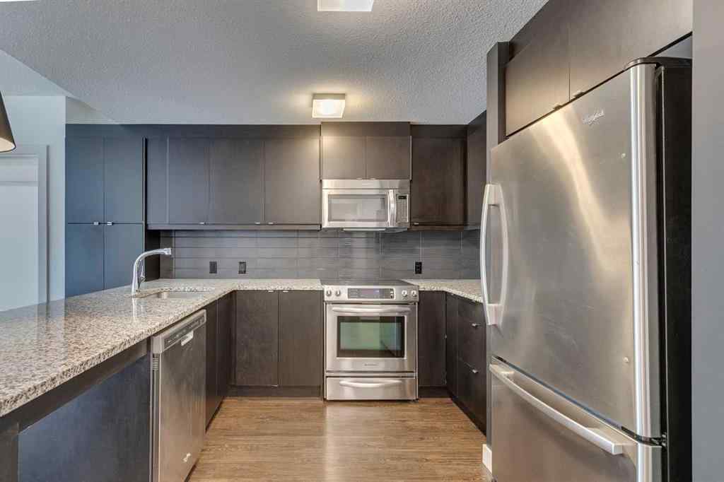 MLS&reg; # A2269831 - Unit #107 25 Aspenmont Heights SW in Aspen Woods Calgary, Residential Open Houses