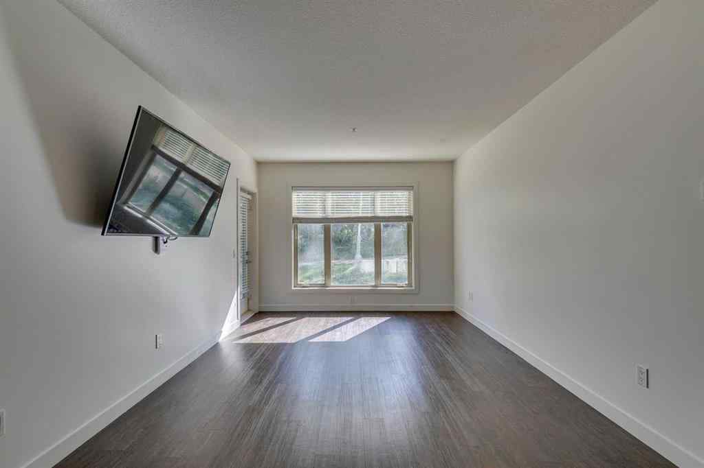 MLS&reg; # A2269831 - Unit #107 25 Aspenmont Heights SW in Aspen Woods Calgary, Residential Open Houses