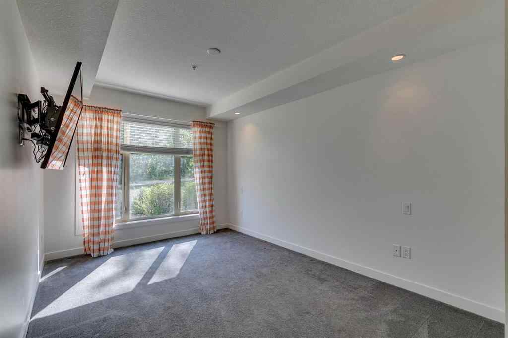 MLS&reg; # A2269831 - Unit #107 25 Aspenmont Heights SW in Aspen Woods Calgary, Residential Open Houses