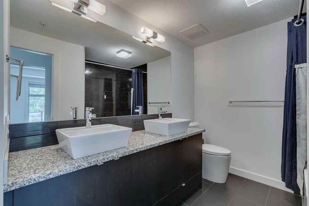 MLS&reg; # A2269831 - Unit #107 25 Aspenmont Heights SW in Aspen Woods Calgary, Residential Open Houses