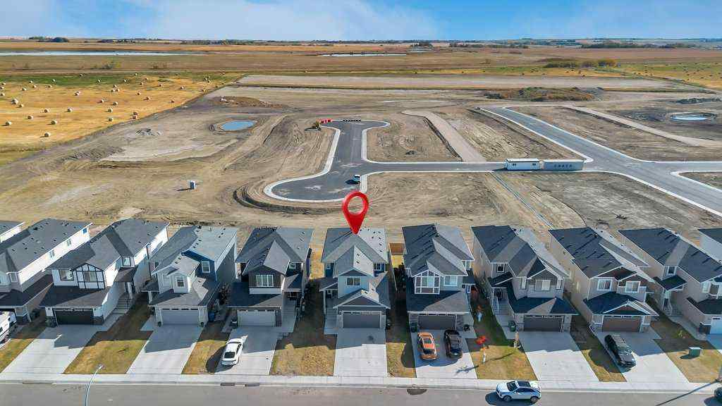 MLS&reg; # A2269838 - 828 Edgefield Street  in Edgefield Strathmore, Residential Open Houses