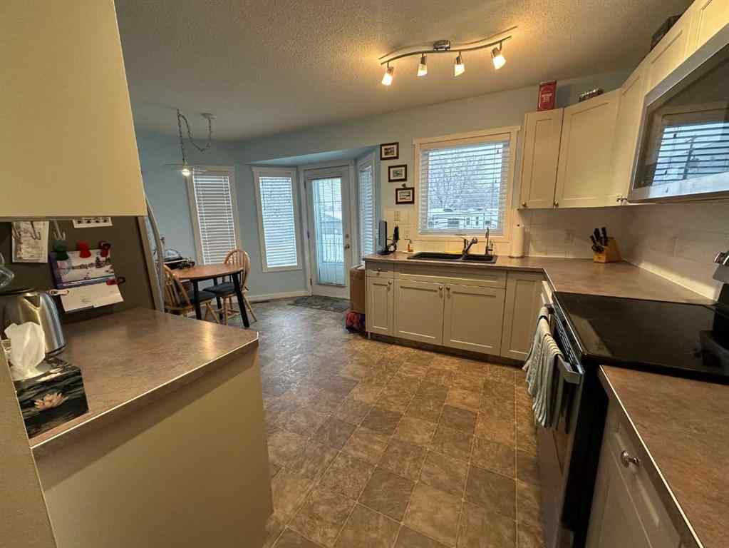 MLS&reg; # A2269840 - 1705 17 Street  in NONE Didsbury, Residential Open Houses