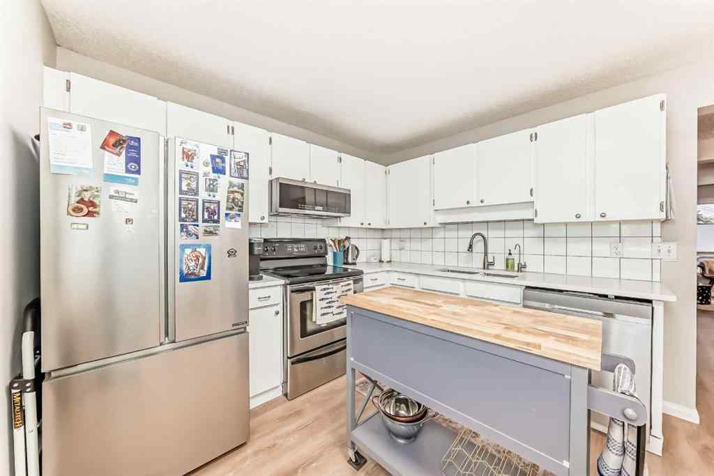 MLS® # A2269855 - 21 Woodfern Road SW in Woodbine Calgary, Residential Open Houses