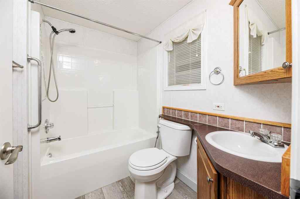 MLS&reg; # A2269863 - 2152 Danielle Drive  in Davenport Red Deer, Mobile Open Houses