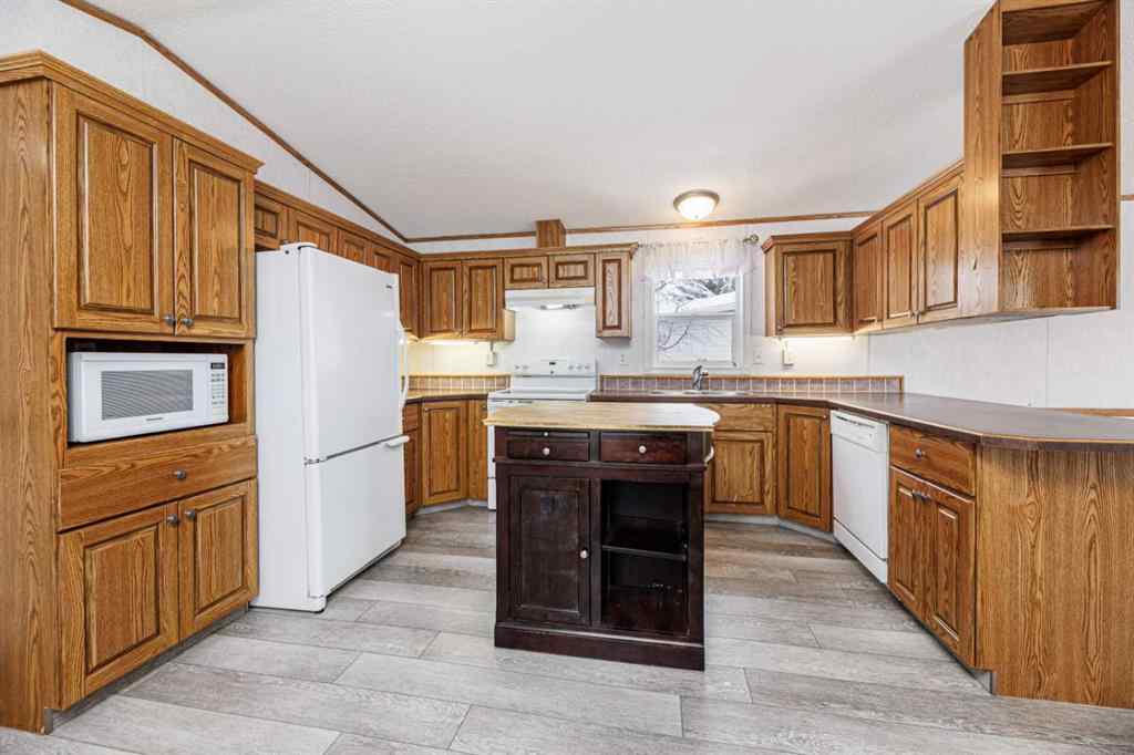 MLS&reg; # A2269863 - 2152 Danielle Drive  in Davenport Red Deer, Mobile Open Houses