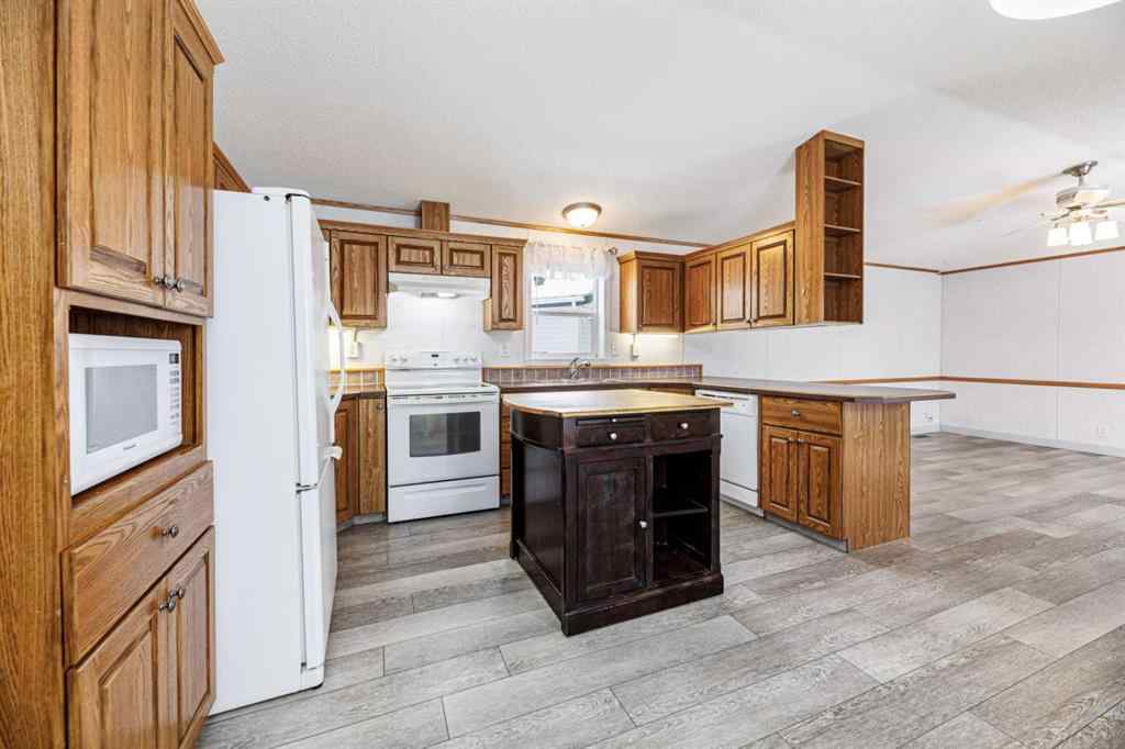 MLS&reg; # A2269863 - 2152 Danielle Drive  in Davenport Red Deer, Mobile Open Houses