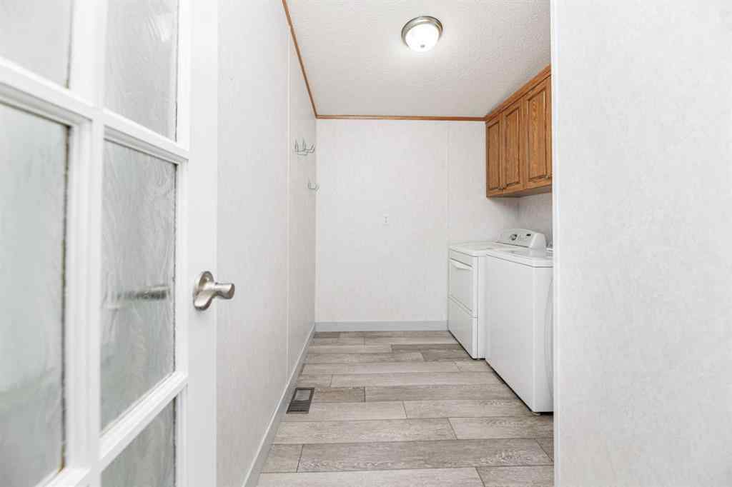 MLS&reg; # A2269863 - 2152 Danielle Drive  in Davenport Red Deer, Mobile Open Houses