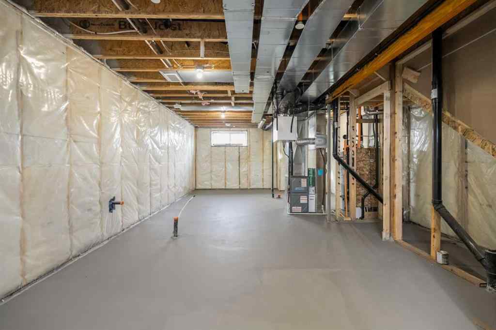 MLS® A2269869 - 497 Hotchkiss Drive SE in Hotchkiss Calgary, Residential