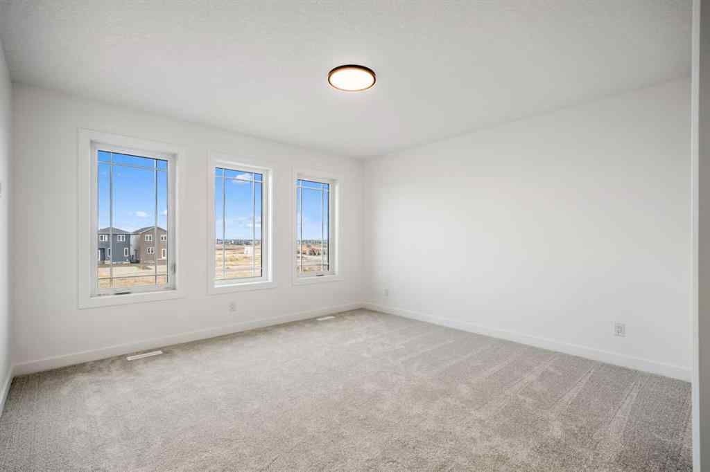 MLS® A2269869 - 497 Hotchkiss Drive SE in Hotchkiss Calgary, Residential