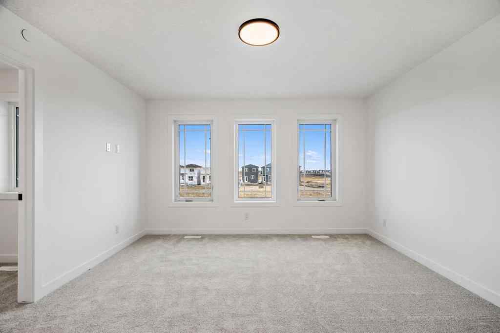 MLS® A2269869 - 497 Hotchkiss Drive SE in Hotchkiss Calgary, Residential