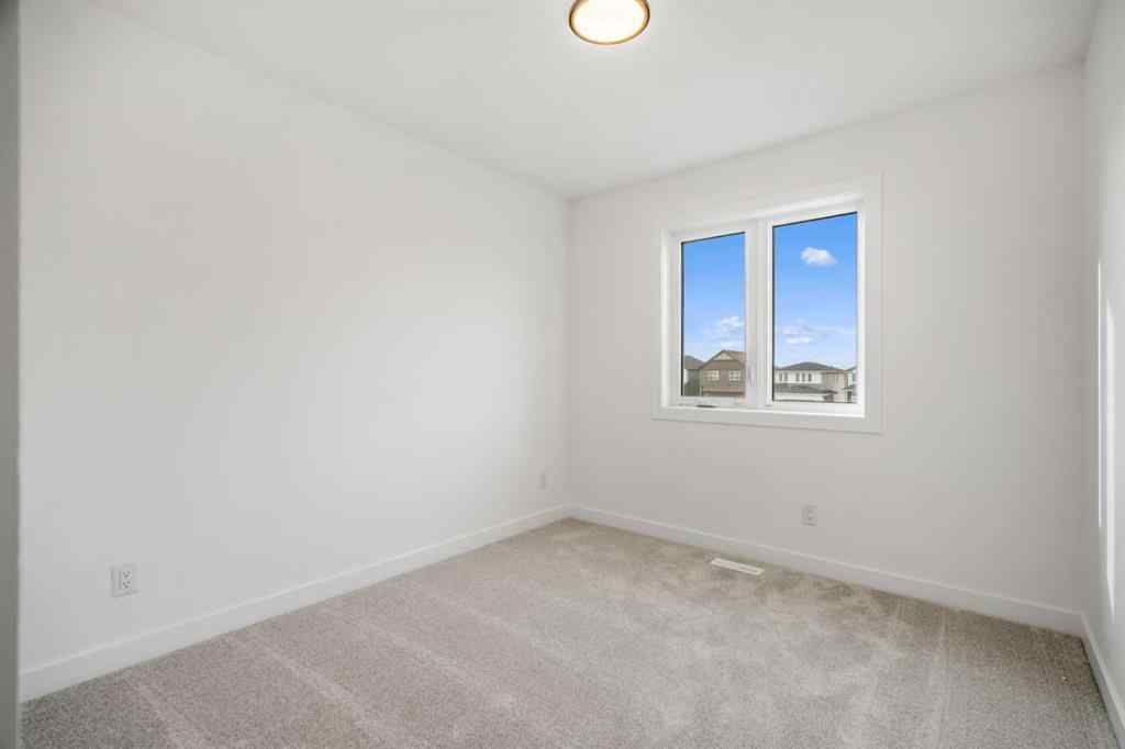 MLS® A2269869 - 497 Hotchkiss Drive SE in Hotchkiss Calgary, Residential