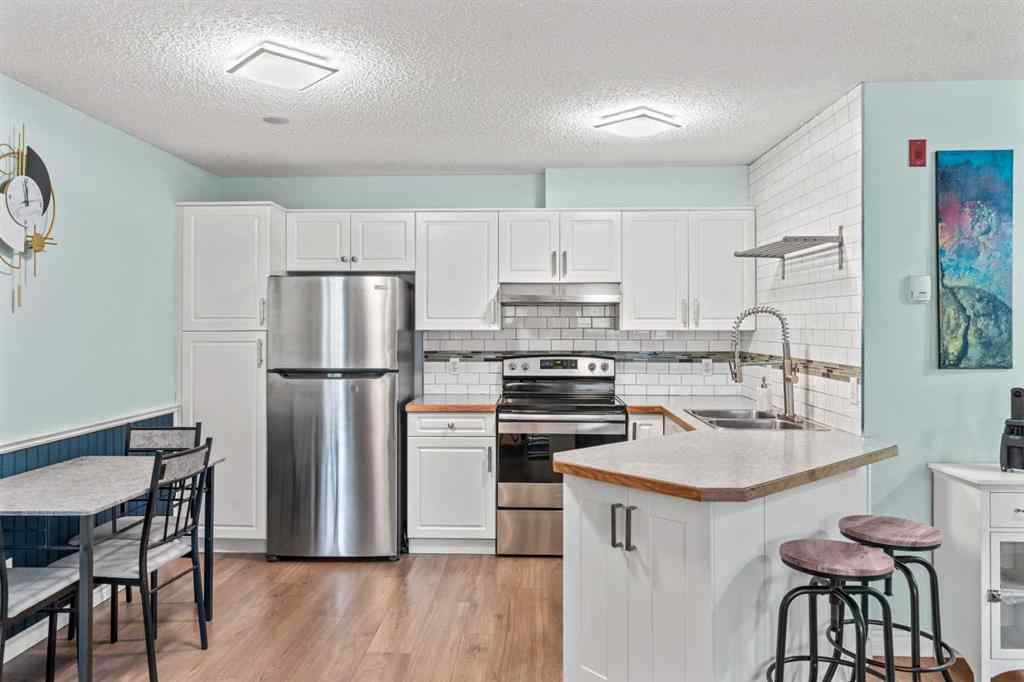 MLS&reg; # A2269872 - Unit #111 20 Sierra Morena Mews SW in Signal Hill Calgary, Residential Open Houses